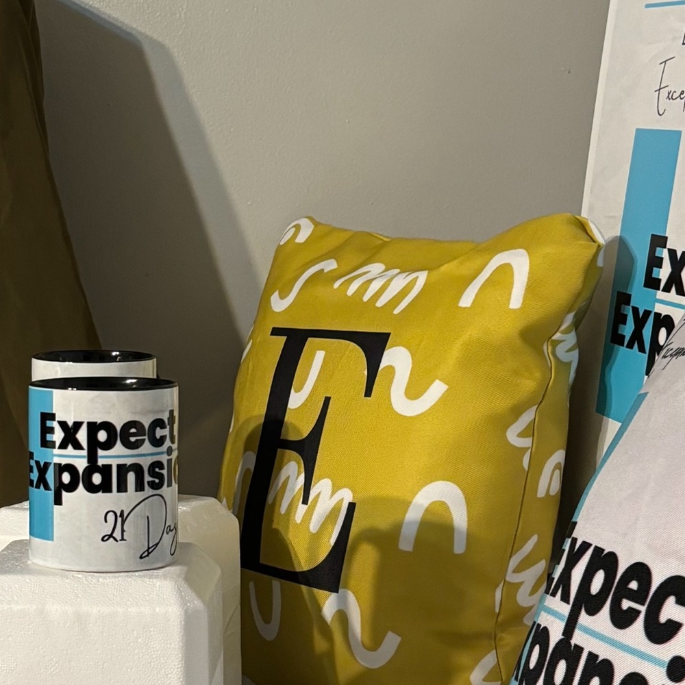 “E” Yellow Graphic Pillow with Black Lettering